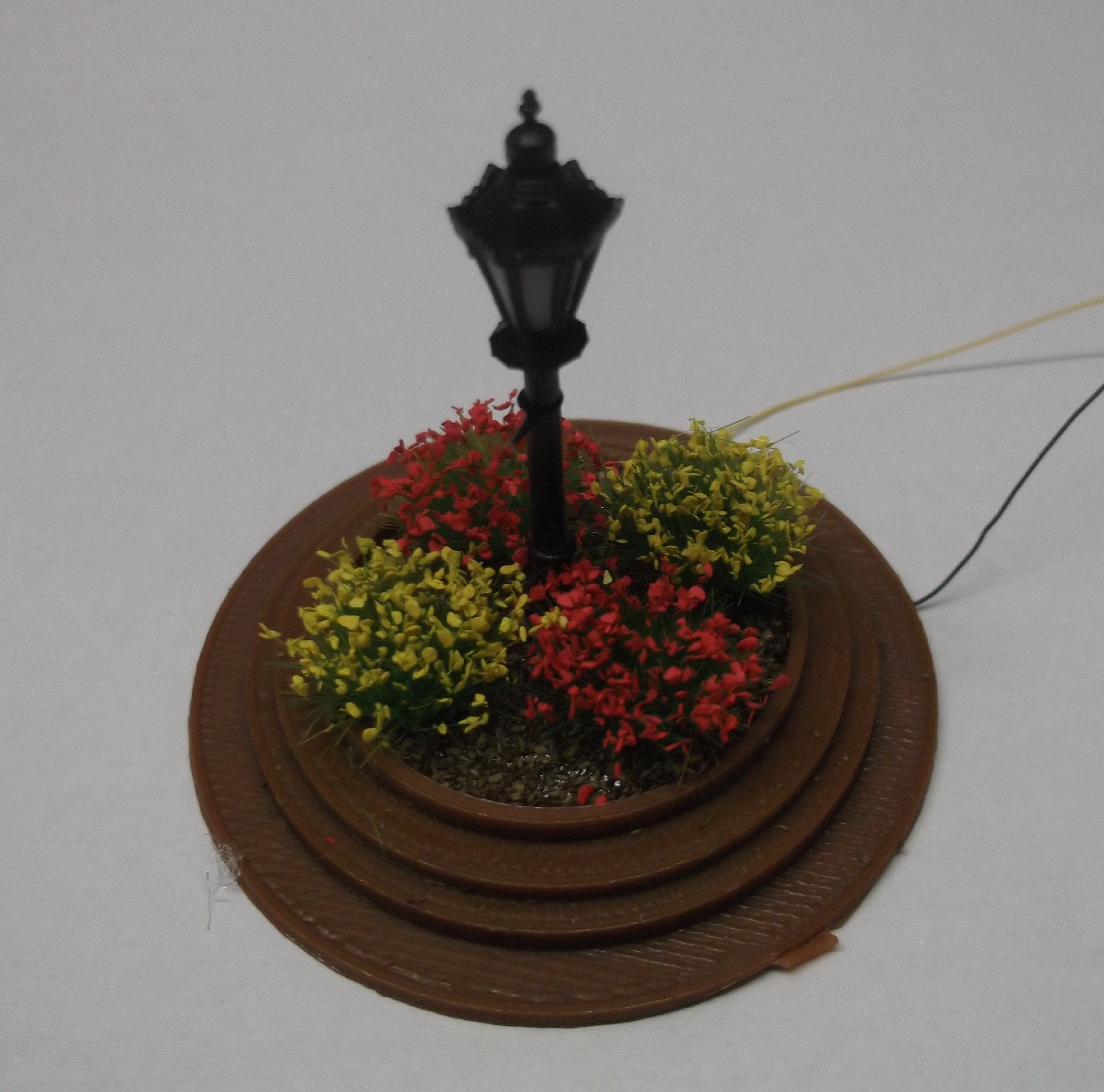 Ornamental Flowerbed with Lamppost